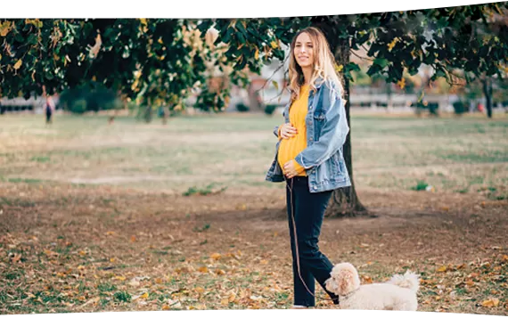 Pregnant lady walking the dog