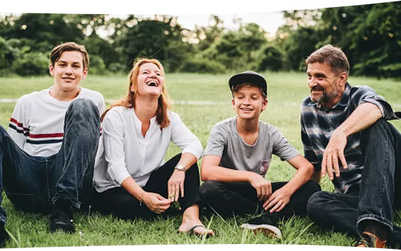 Sitting in the park on the grass