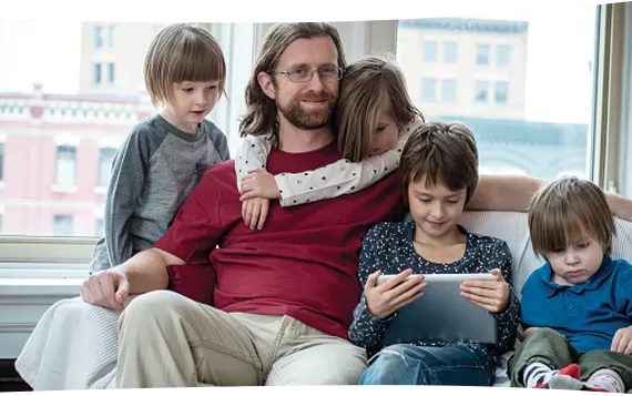 On the couch with children